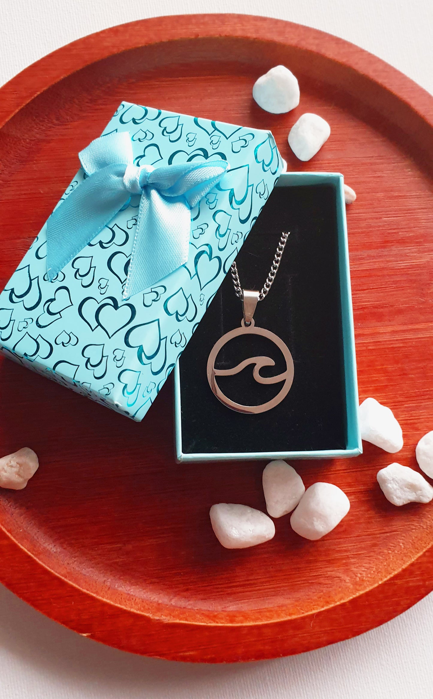 Stainless steel necklace with wave pendant